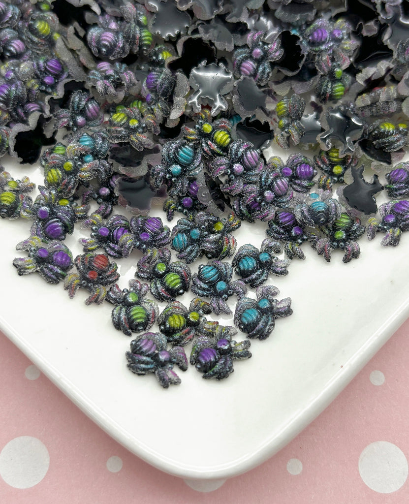 a white plate topped with lots of purple and green bugs