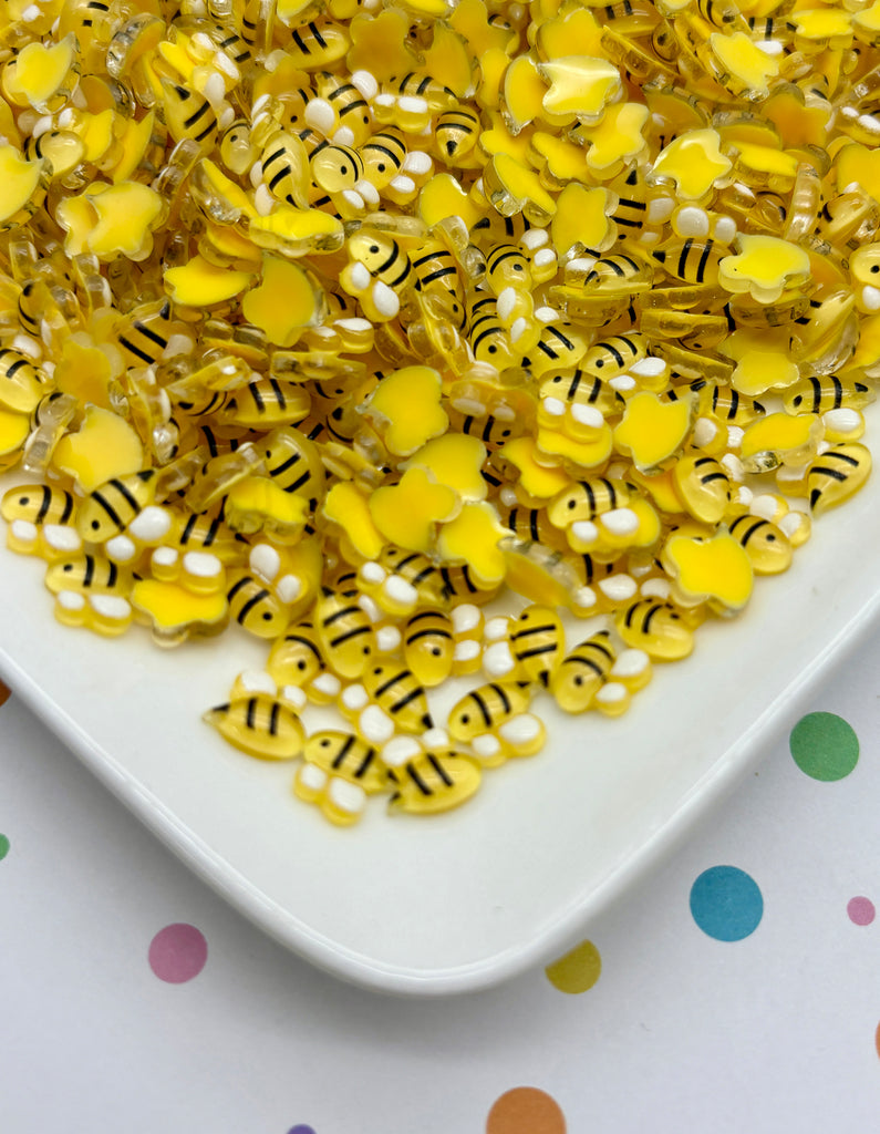a white plate topped with lots of yellow candies