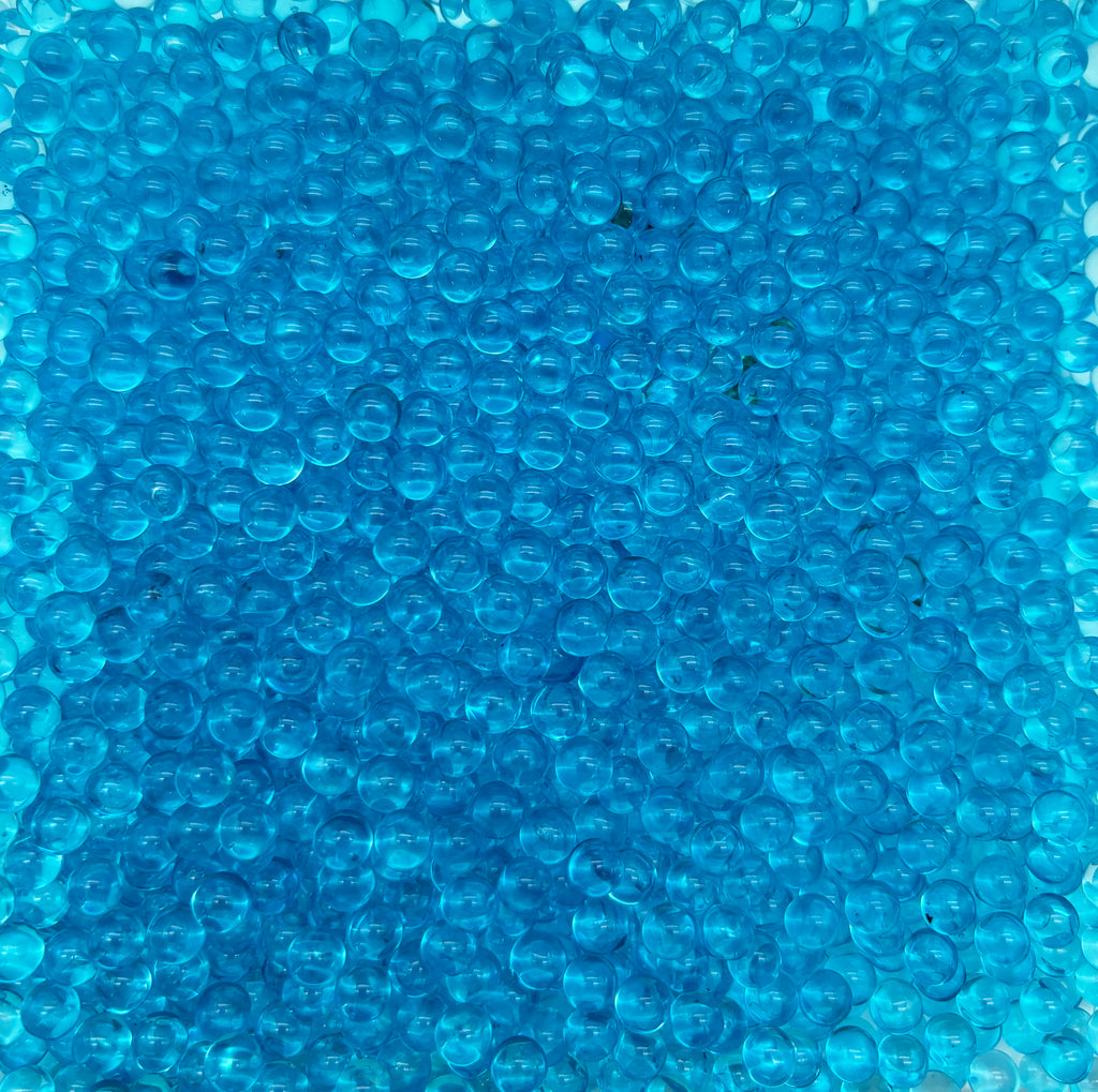 a close up of a blue square made of bubbles