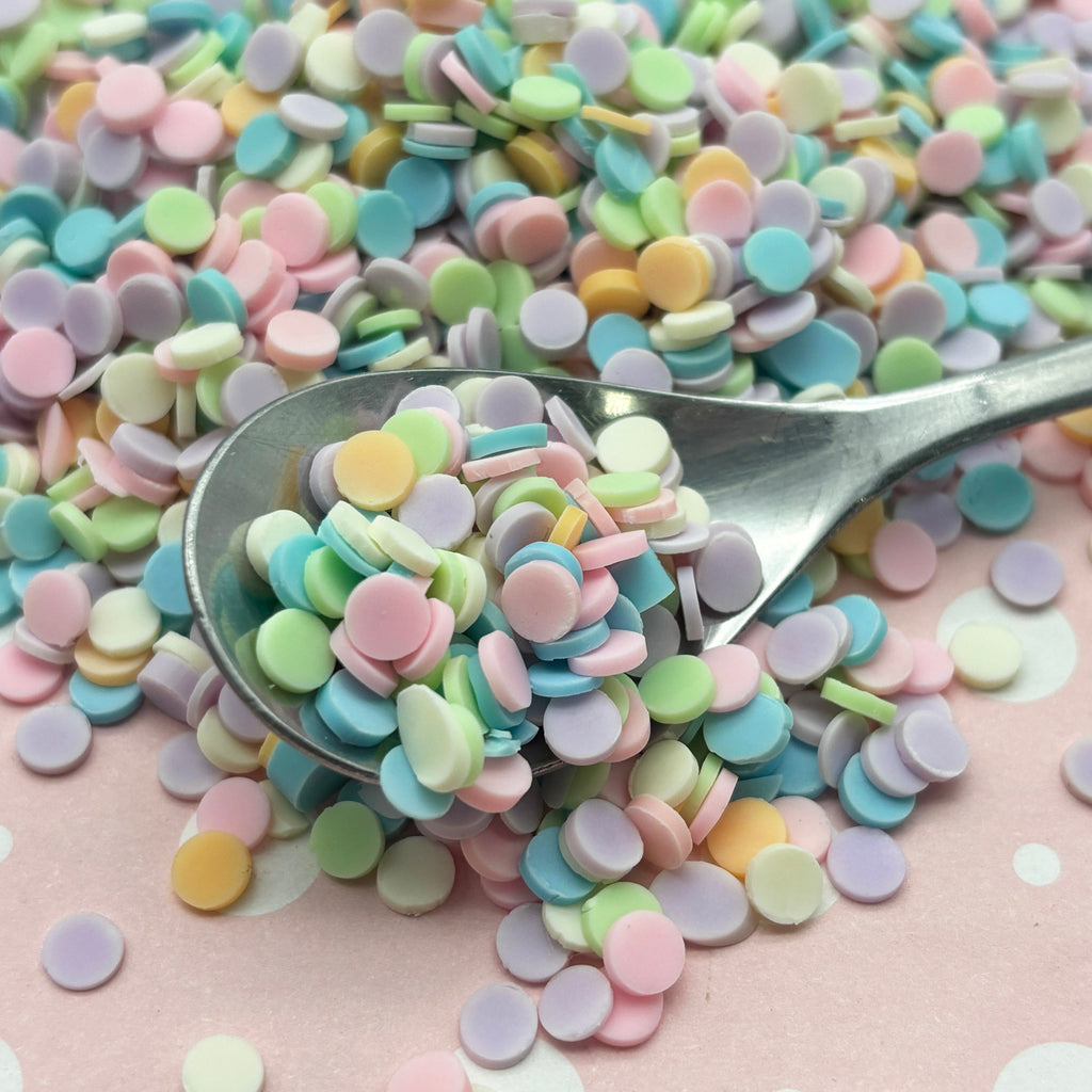 a spoon full of colorful candy sprinkles