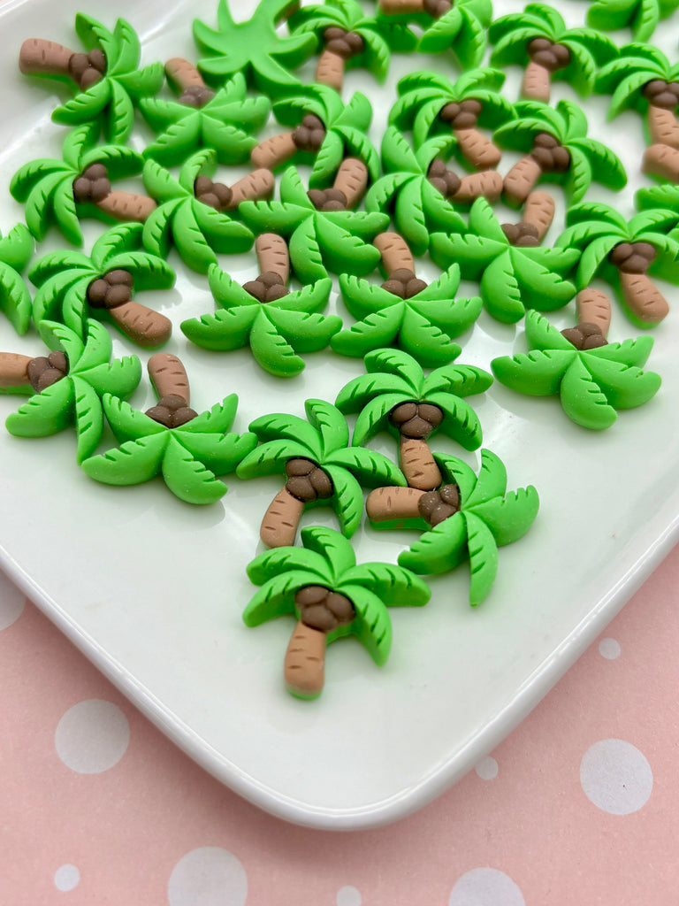 a white plate topped with green and brown cookies