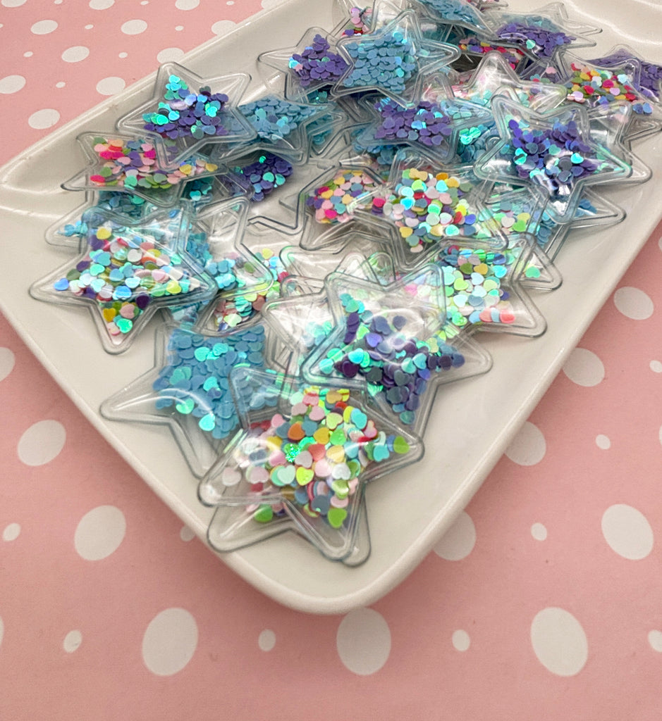 a tray of star shaped confetti on a table