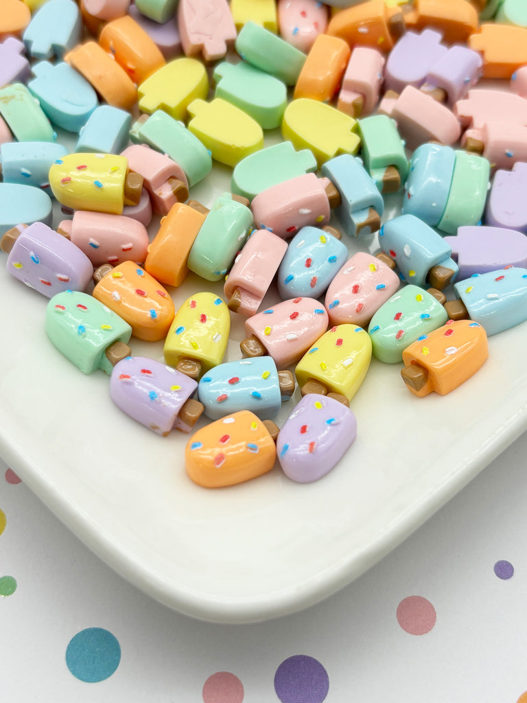 a white plate topped with lots of colorful candies