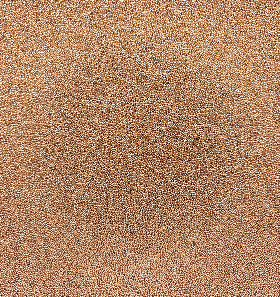 a close up view of a brown carpet