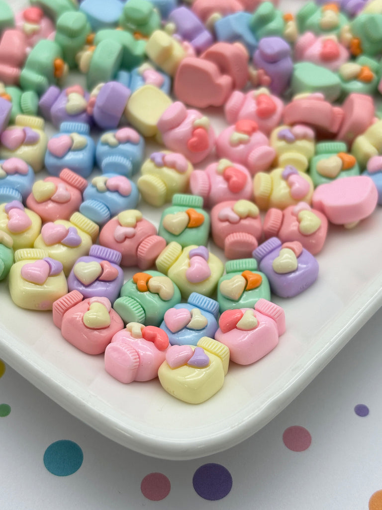 a white plate topped with lots of colorful candies