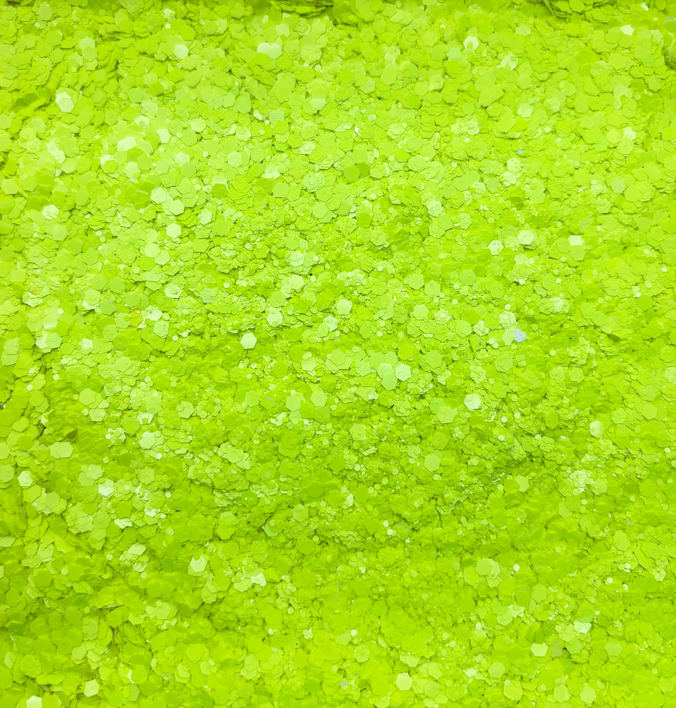 a close up of a green background with small dots