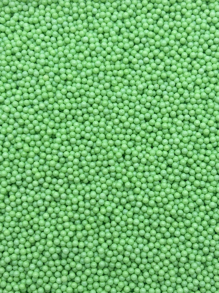 a close up view of a green surface
