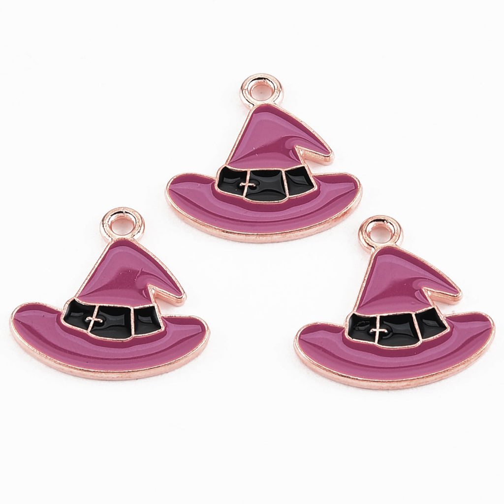 three charms in the shape of a witches hat