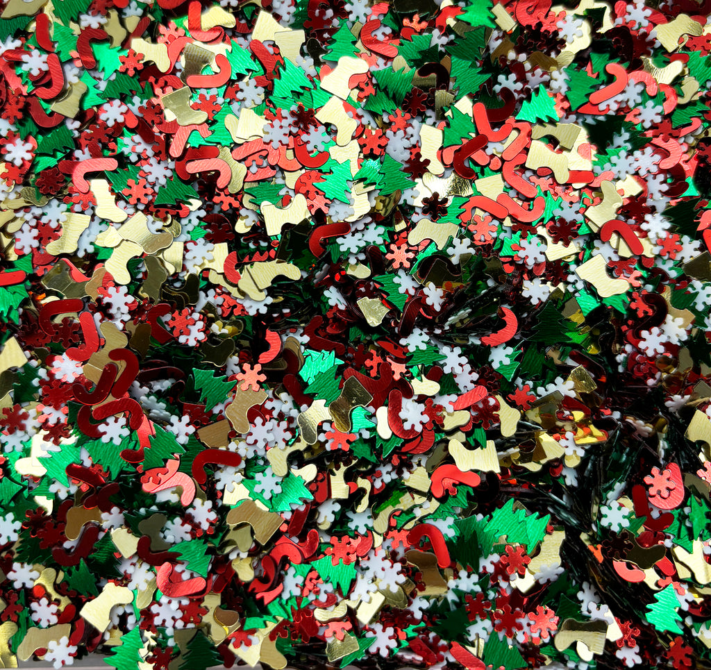 a large pile of christmas sprinkles on a table