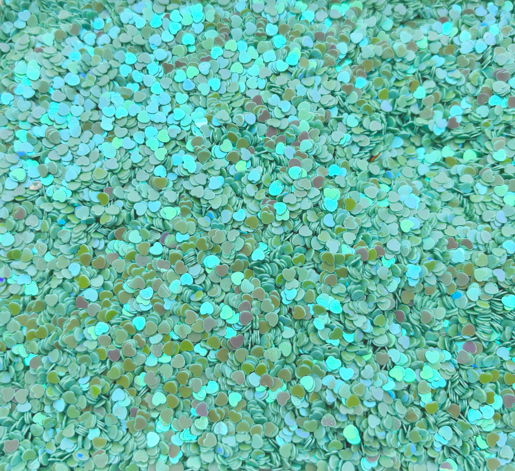 a large amount of green and blue confetti