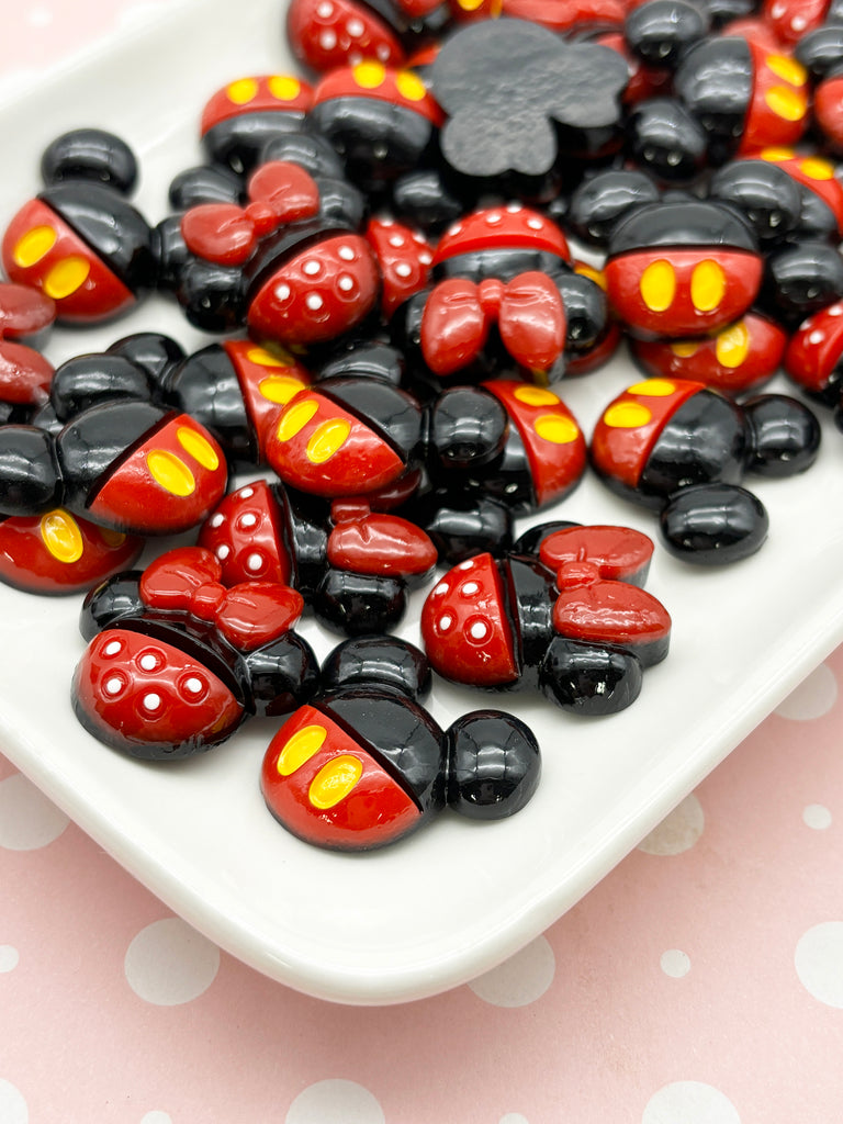 a white plate topped with lots of black and red candy