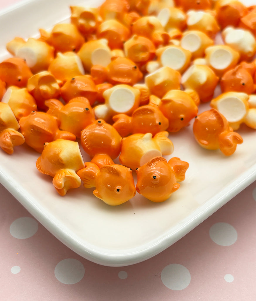 a white plate topped with lots of orange candies