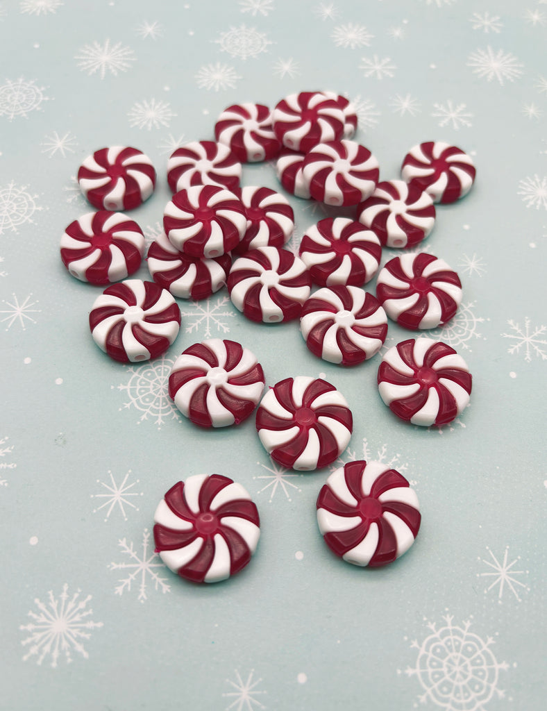 a pile of candy canes sitting on top of a table