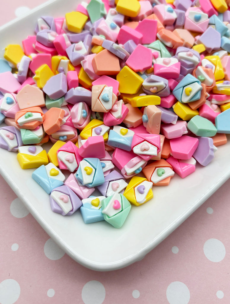 a white plate topped with lots of colorful candy