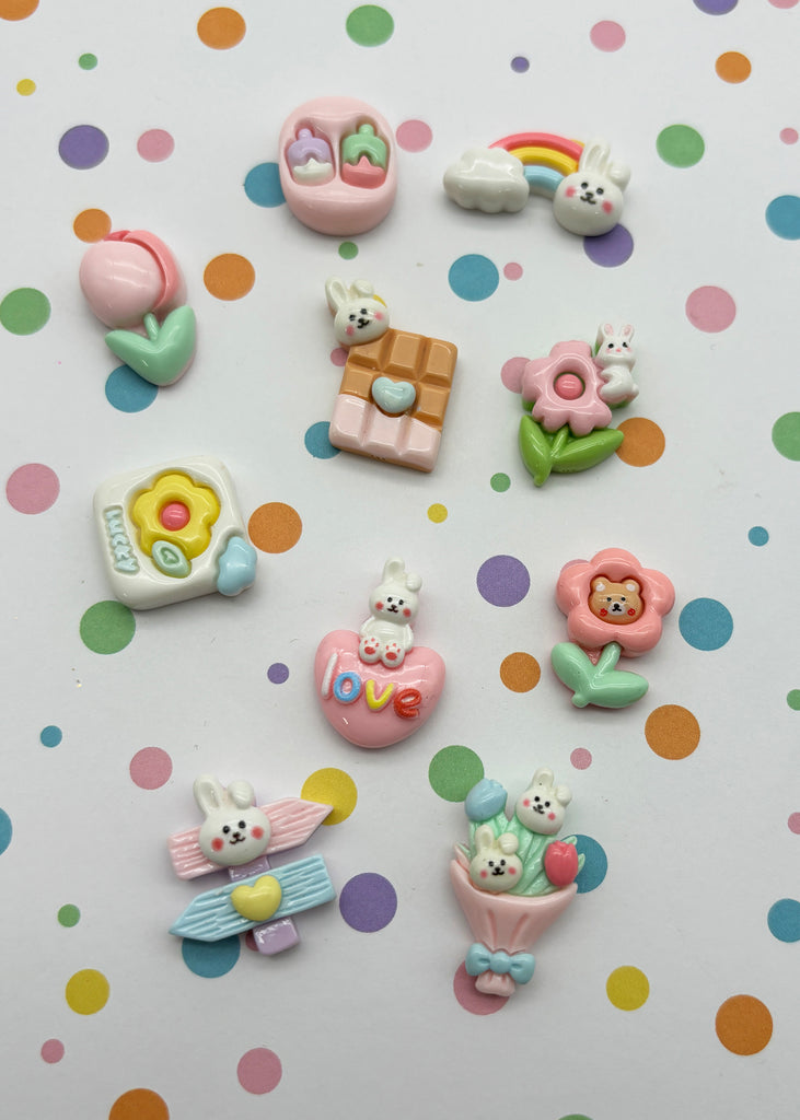 a group of small toy animals sitting on top of a table