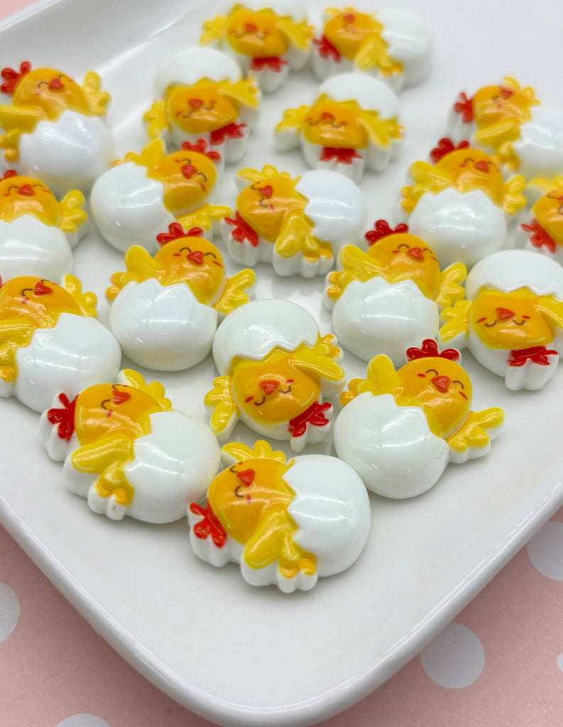 a white plate topped with hard boiled eggs