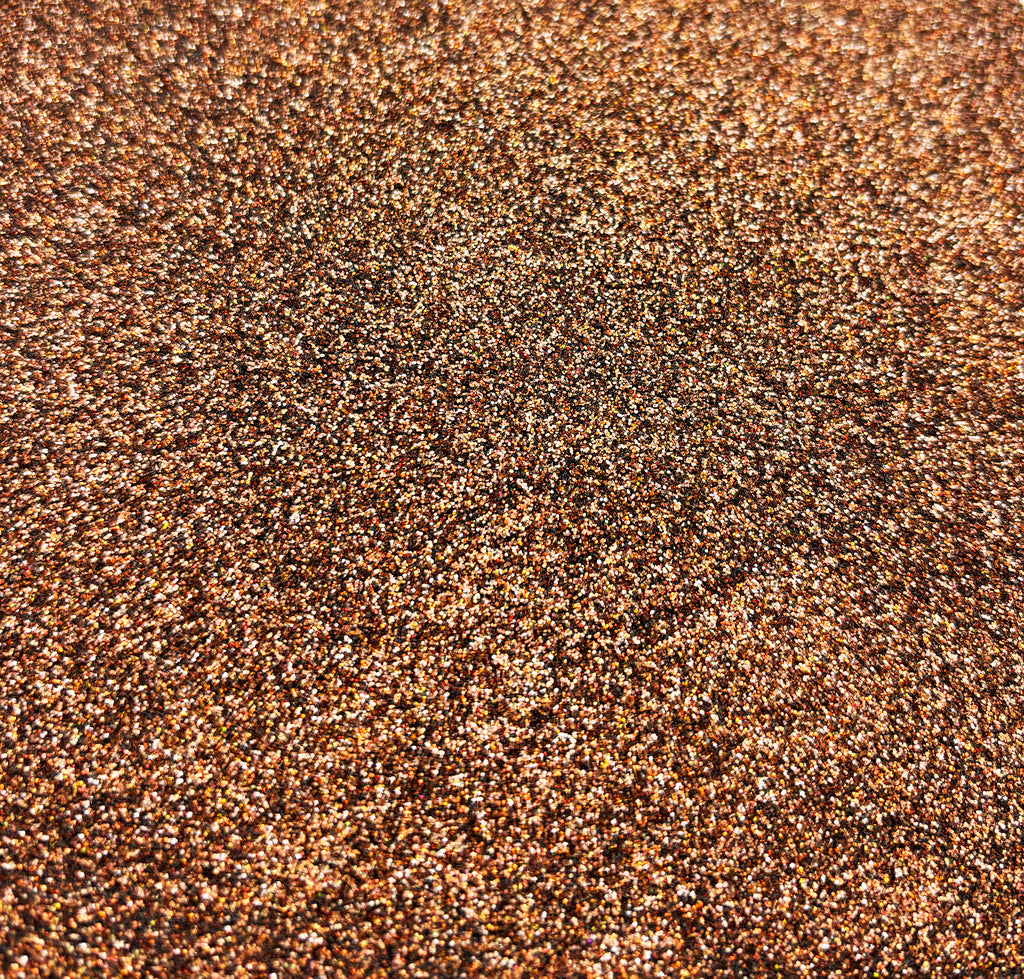 a close up view of some brown glitter
