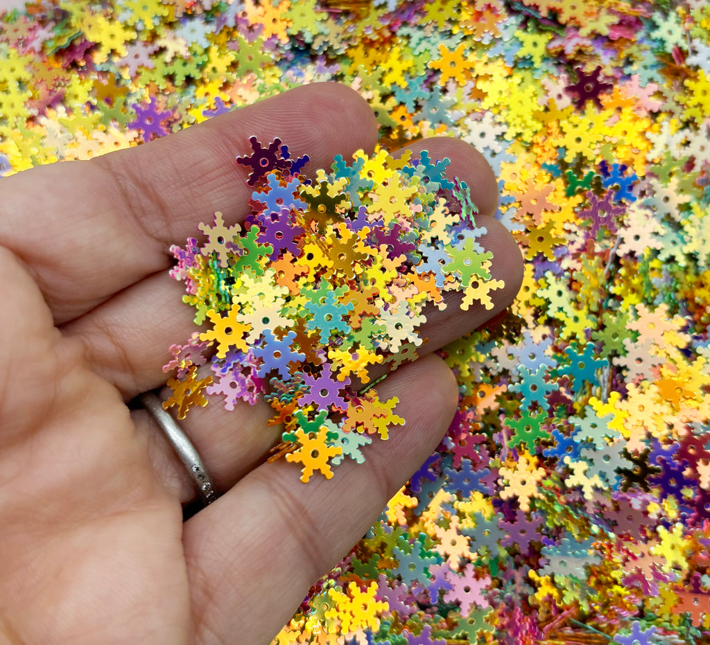 a person holding a piece of puzzle in their hand