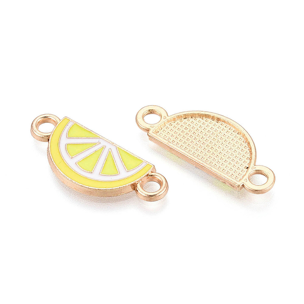 two pieces of jewelry with a lemon slice design.