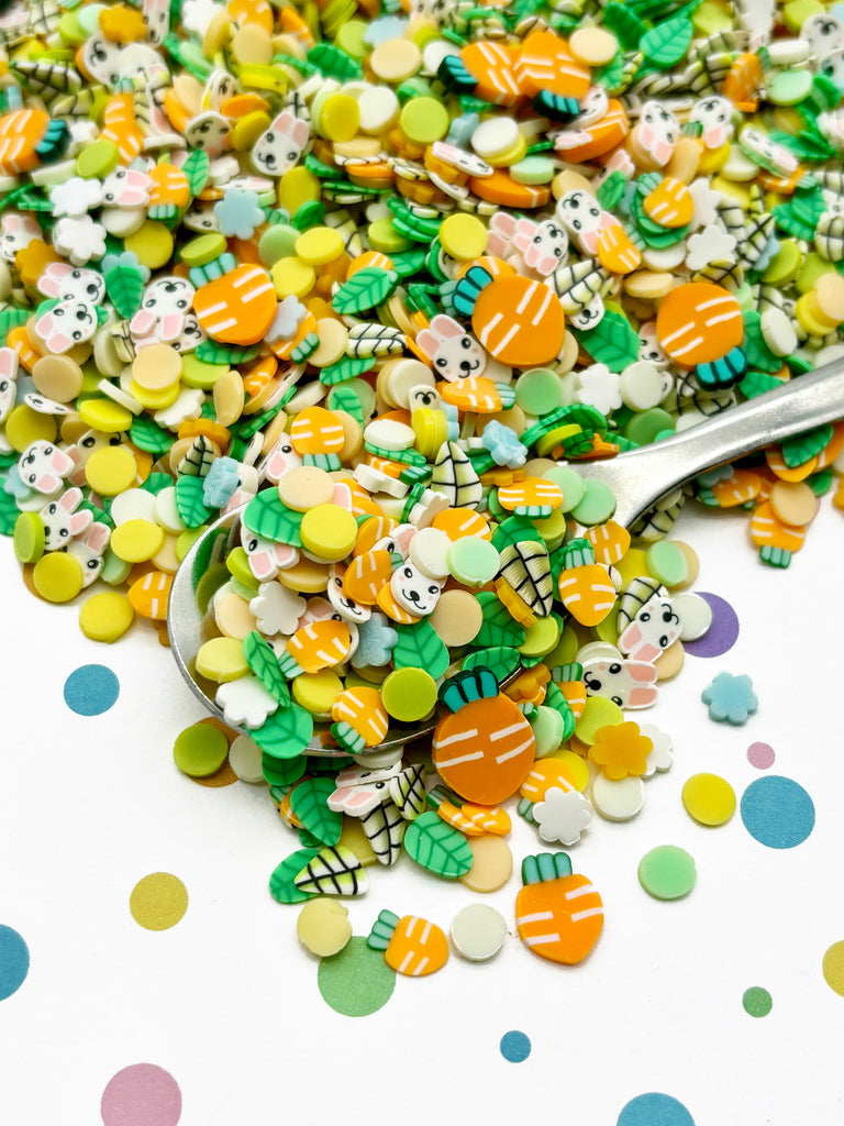 a pile of colorful buttons sitting on top of a table