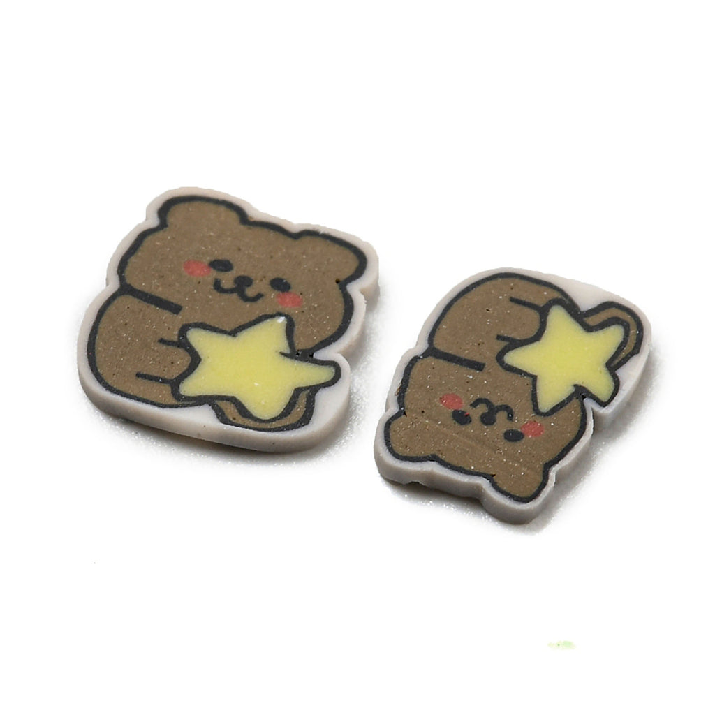 two brown teddy bears with stars on them