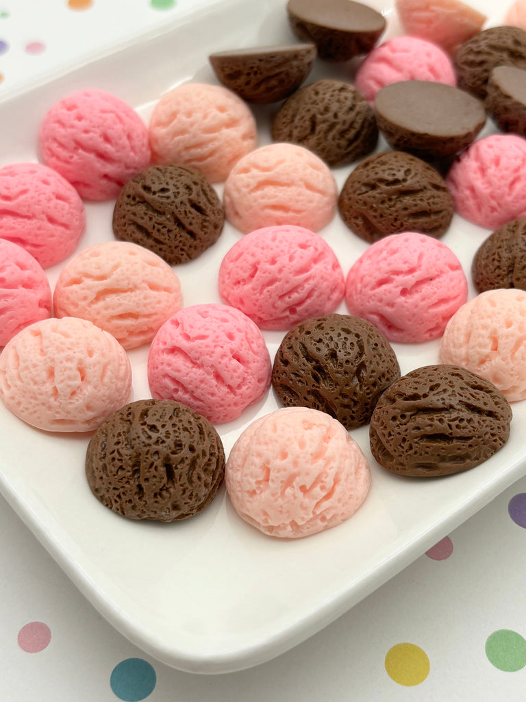 a white plate topped with different types of cookies