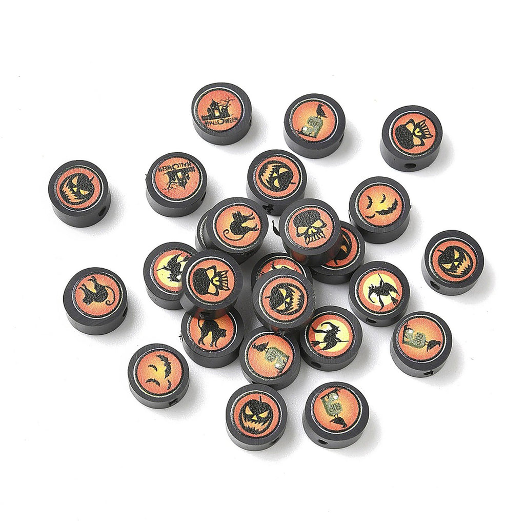 a collection of black beads with various Halloween-themed designs on them, including skulls, bats, and other spooky symbols.