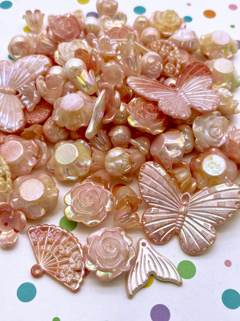 a close up of a bunch of beads on a table