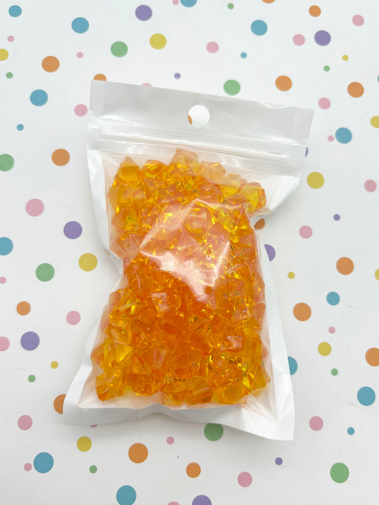 a bag of gummy bears sitting on top of a table