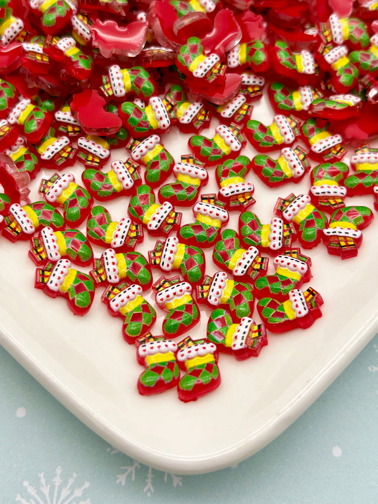 a white plate topped with lots of red and green hearts