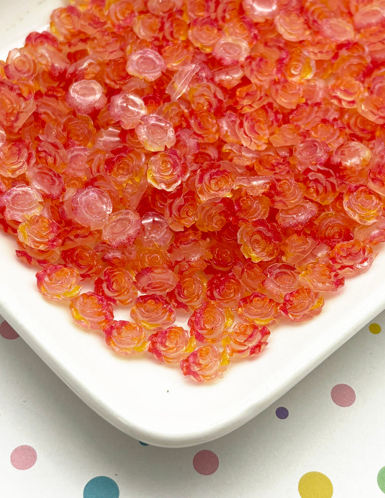 a white plate topped with gummy bears on top of a table