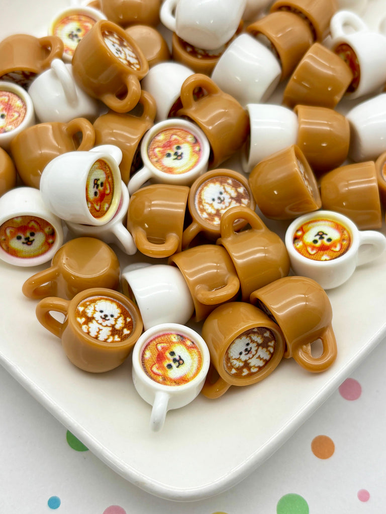 a collection of small, brown plastic cups with various designs, including animal faces and coffee cups, arranged on a white surface.