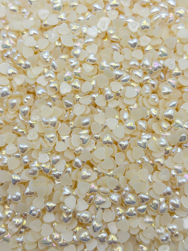 a close up of a bunch of white beads