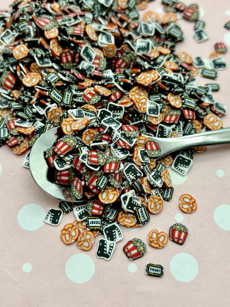 a spoon full of buttons sitting on top of a table