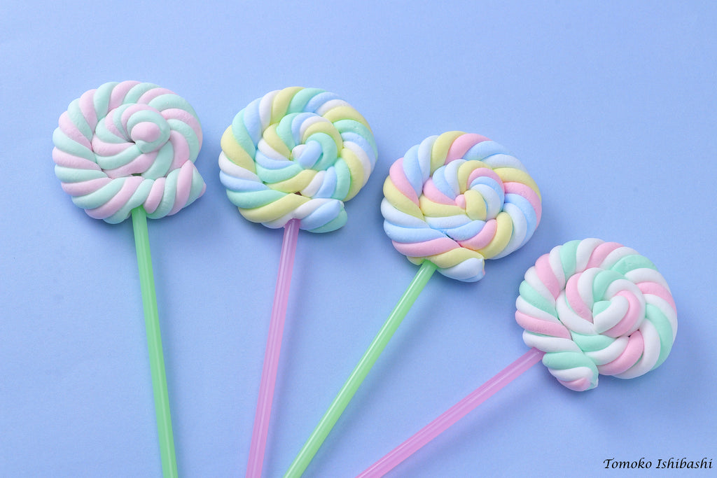 a group of lollipops sitting on top of each other