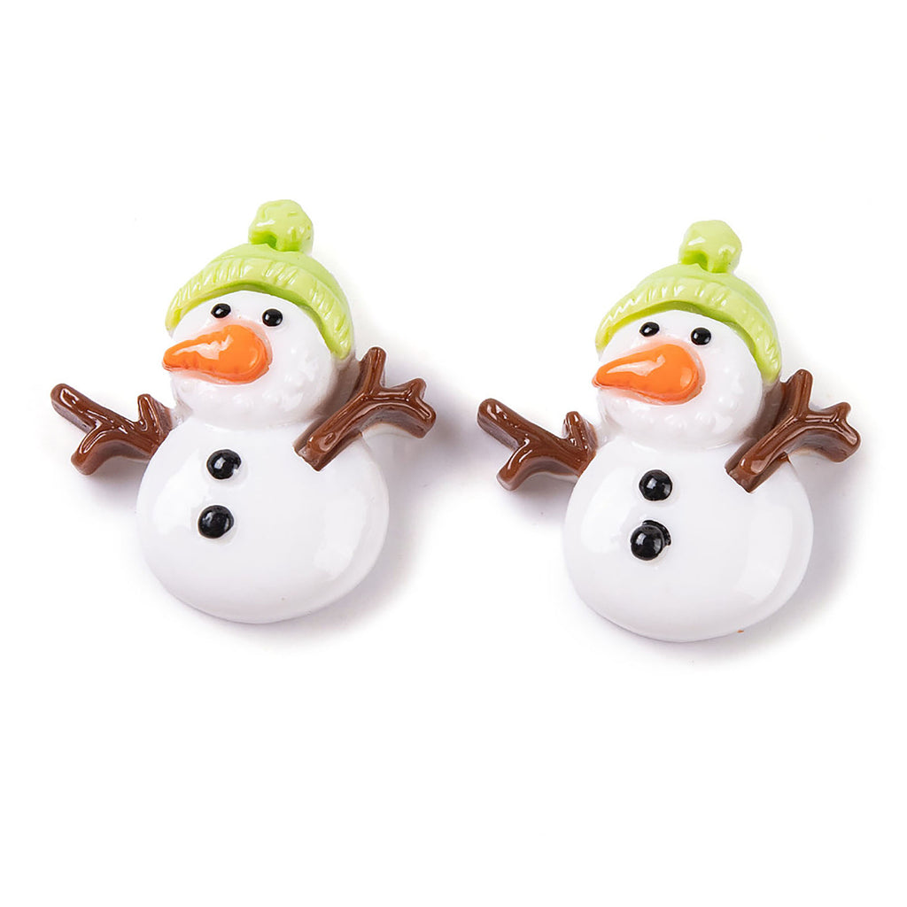 Two snowman magnets with orange noses and green hats, each with brown sticks and black eyes.