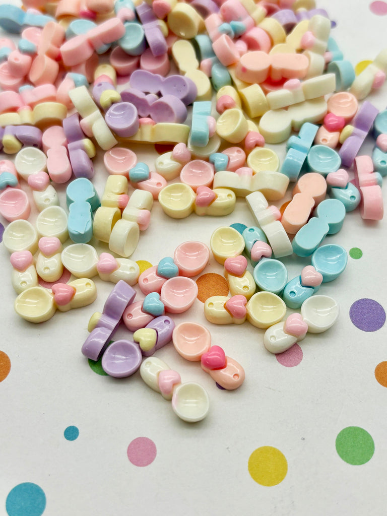 a pile of colorful candies sitting on top of a table