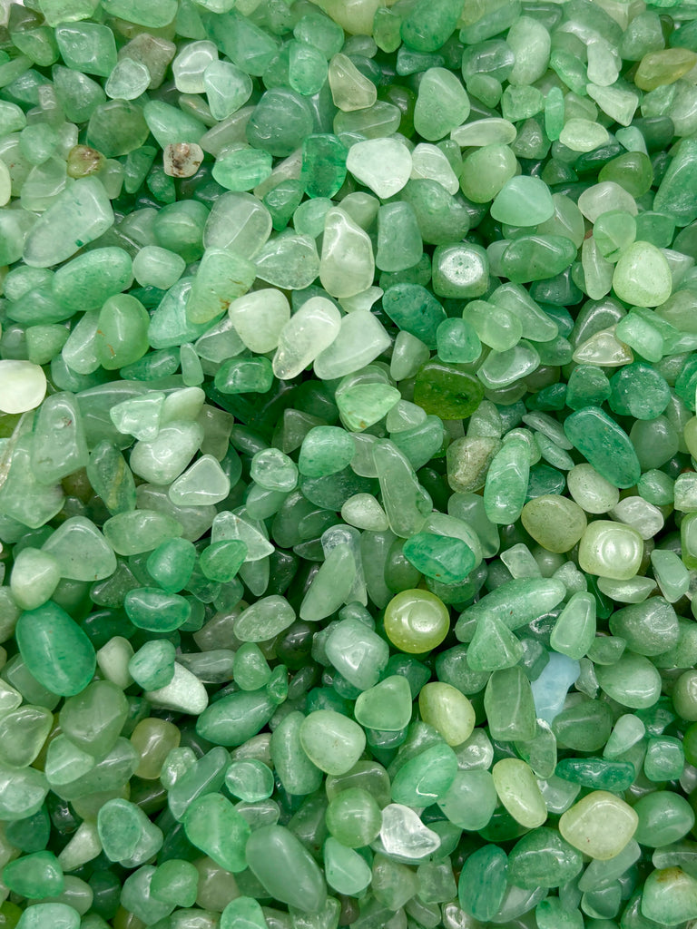 a pile of green and white rocks next to each other