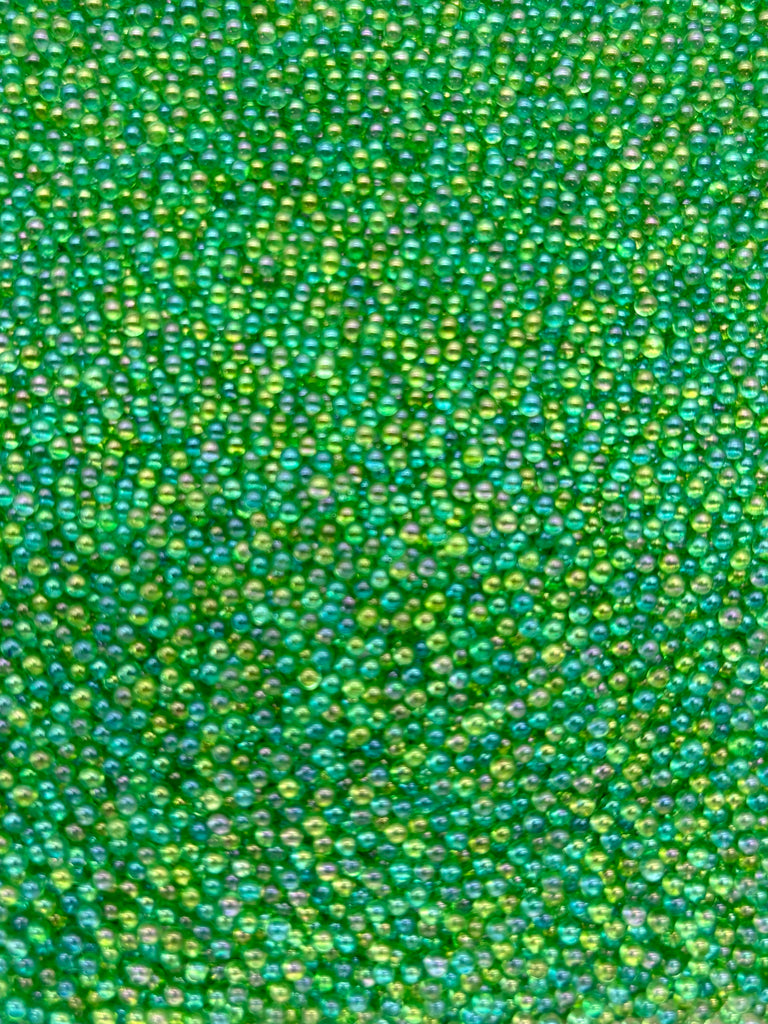 a close up view of a green surface