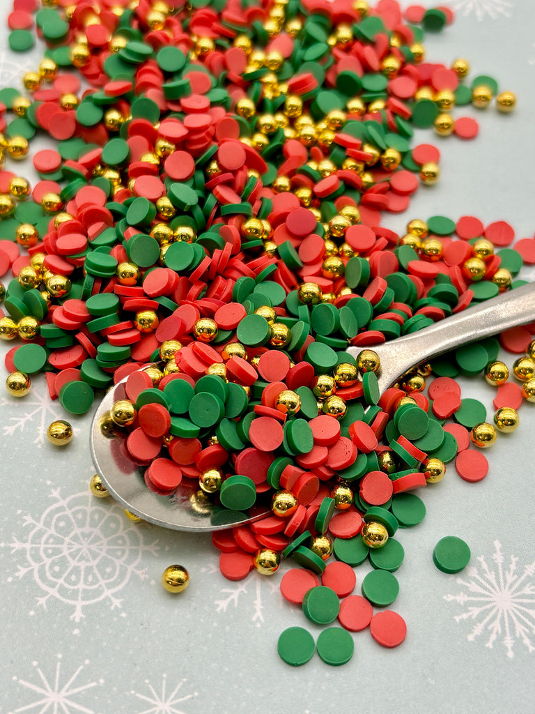 a spoon full of red and green confetti