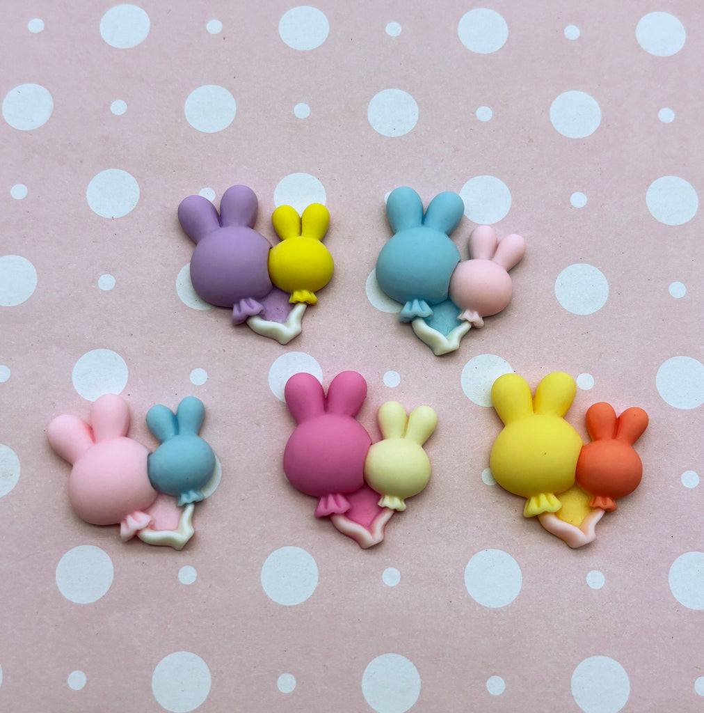 a close up of small plastic animals on a table