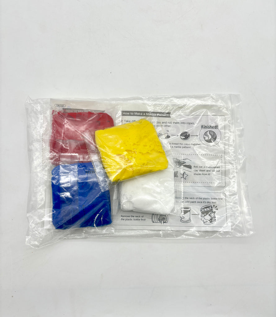 a plastic bag filled with different colored items