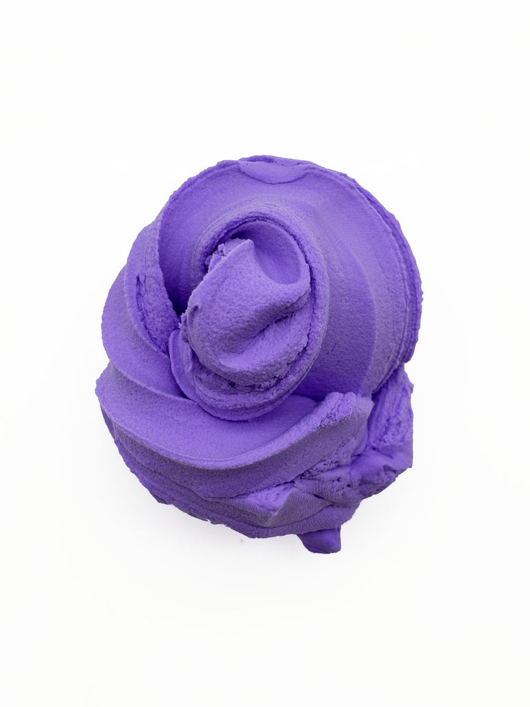 A close-up view of a purple, fluffy substance resembling a cloud or soft, fluffy material.