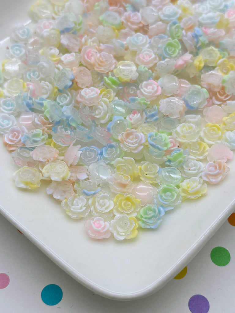 a white plate topped with lots of colorful flowers