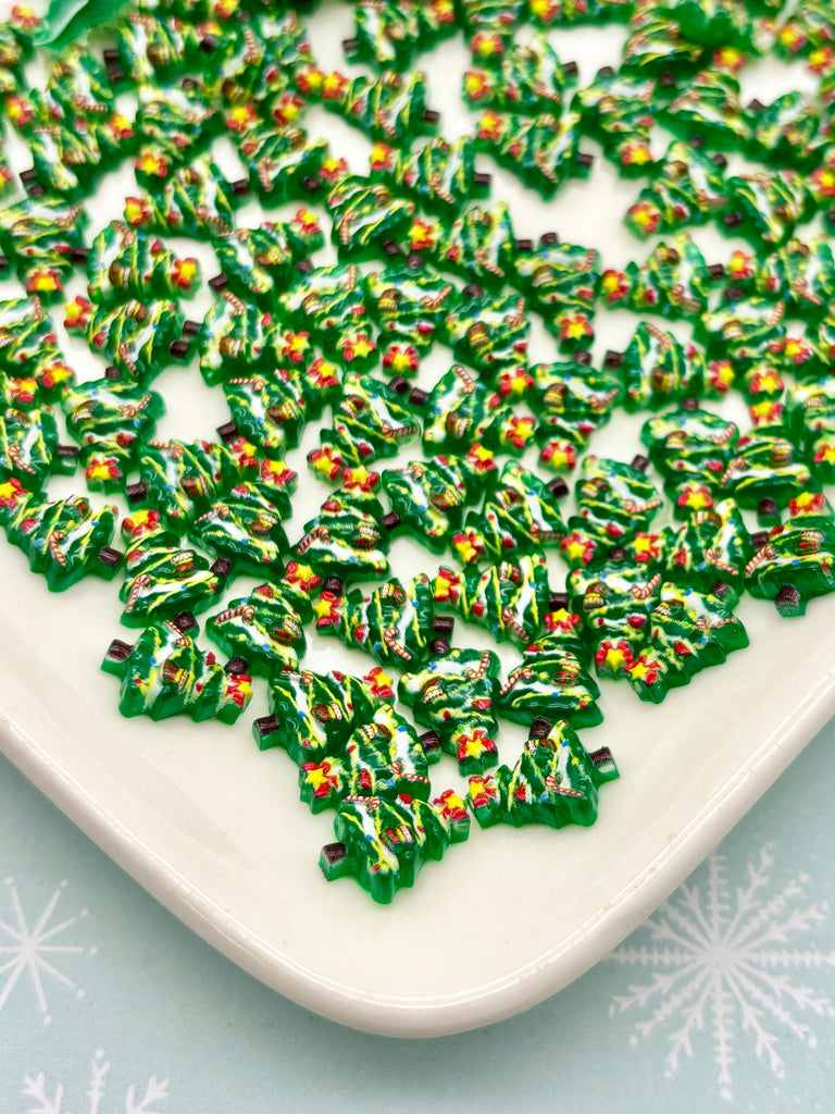 a white plate topped with lots of green sprinkles