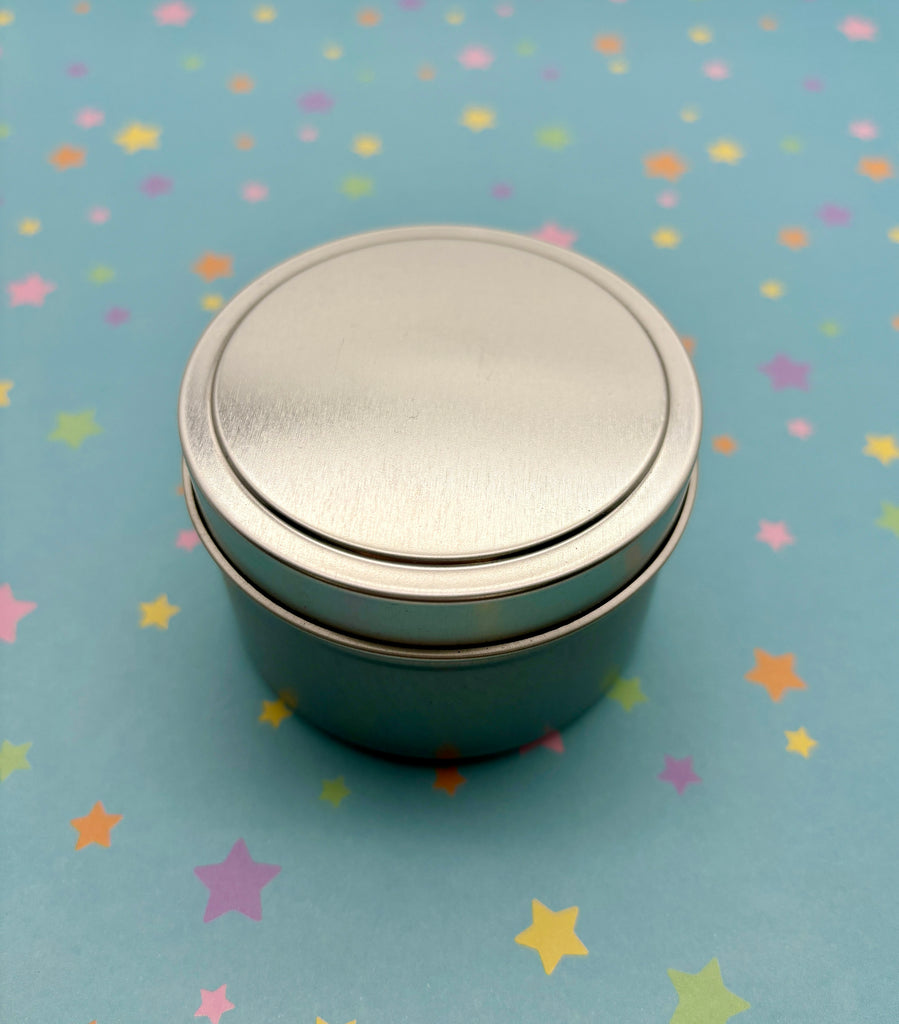 a metal container sitting on top of a table