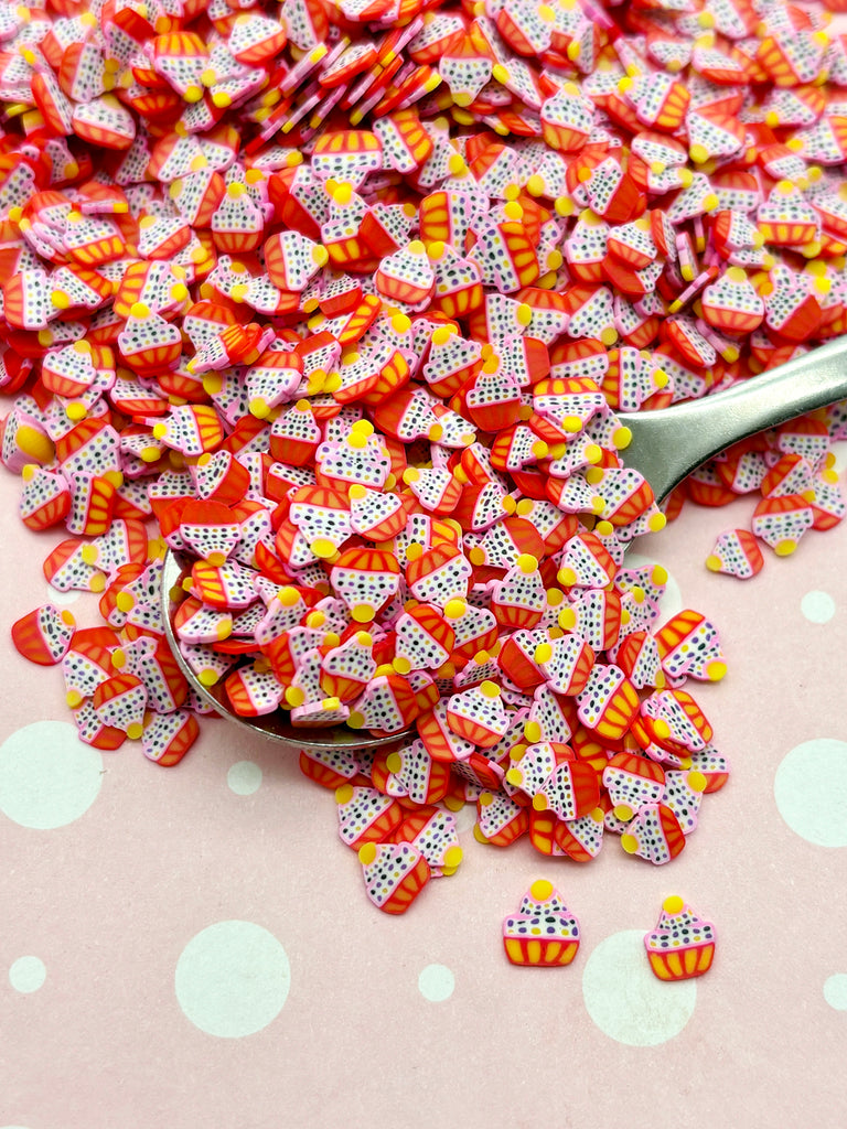 a pile of candy with a spoon on top of it