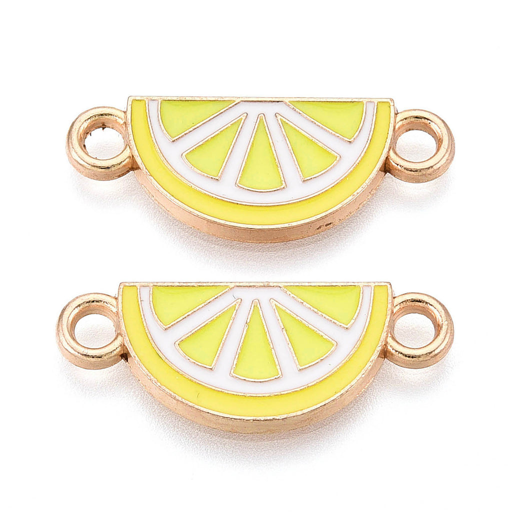 two enamel charms shaped like lemon slices, with a yellow and green color scheme.