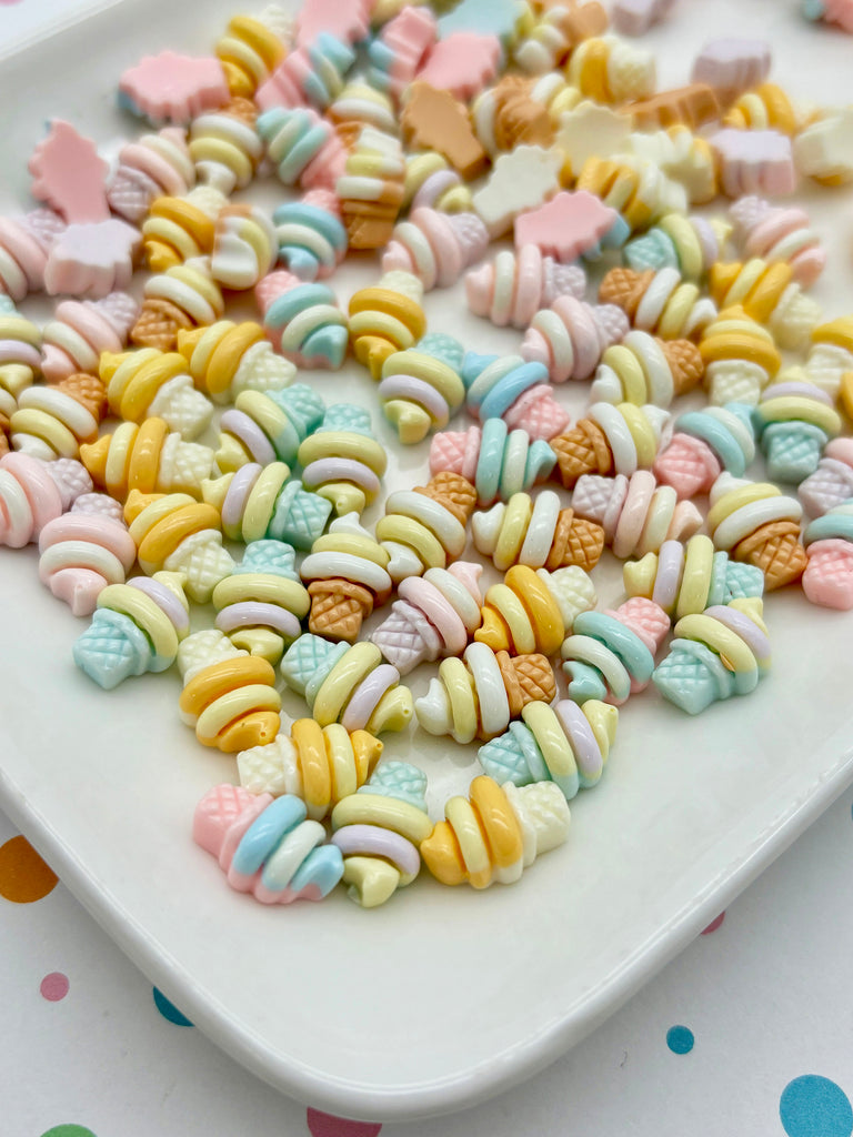 a white plate topped with lots of colorful candy