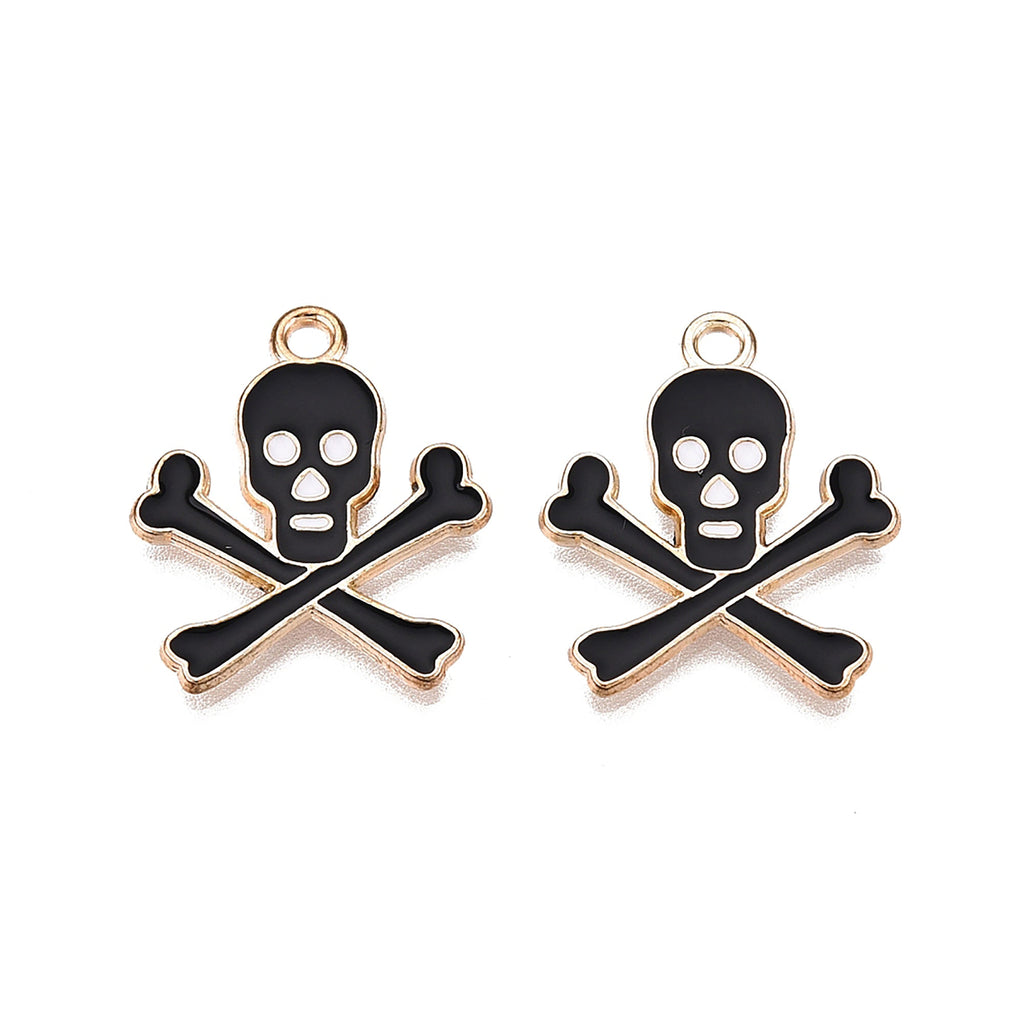 a pair of skull and crossbones charms